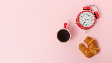 Alarm clock, coffee and croissant with space for morning message. Morning postcard. Positive,...