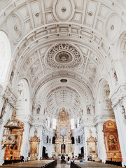 Fototapeta na wymiar Munich, Germany - June 28, 2019: Interior of St. Michael's Church in Munich. St Michael is a Jesuit church. The style of the building had an enormous influence on Southern German early Baroque