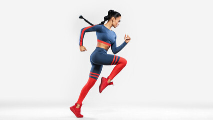 Fototapeta na wymiar Runner running isolated on white background. A strong athletic, women sprinter wearing in the sportswear, fitness and sport motivation. Run concept with copy space. Dynamic movement