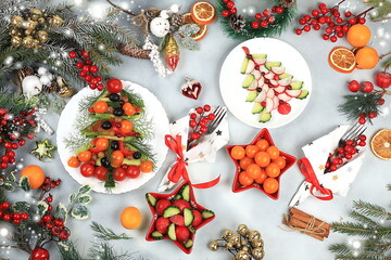Christmas New Year dishes, traditional festive salad with edible vegetarian Christmas trees made of...