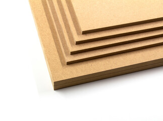 Raw MDF boards are gradually arranged in the shape of a triangle.