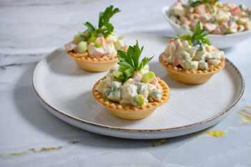 traditional olivier salad in tartlets