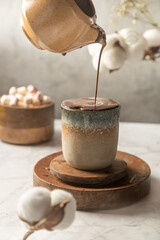 A cup of cocoa and marshmallows 