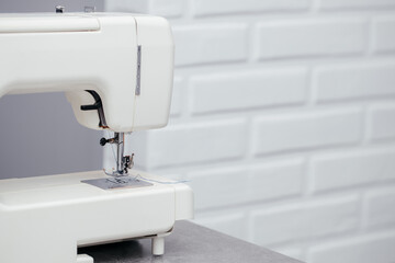 Sewing machine on a table in a sewing workshop