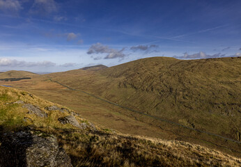 Obraz premium Slieve Muck and Spelga Pass seen from Pigeon Rock mountain during Autumn, Western Mournes area of outstanding natural beauty, County Down,Northern Ireland