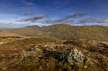 Fototapeta premium Slieve Muck and Spelga Pass seen from Pigeon Rock mountain during Autumn, Western Mournes area of outstanding natural beauty, County Down,Northern Ireland