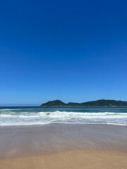 Fototapeta na wymiar beach and sea, sea waves, blue sky and sand, picture to frame