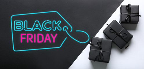 Gift boxes with text BLACK FRIDAY on dark and light background