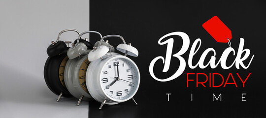 Alarm clocks with text BLACK FRIDAY TIME on dark and light background