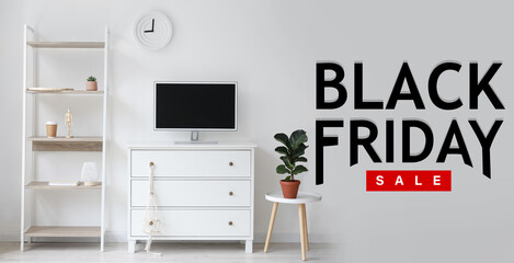 Interior of light living room with text BLACK FRIDAY SALE