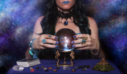 Psychic with crystal ball and tarot cards, Shallow DOF