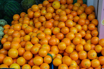 Fresh organic orange fruit stand