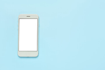 Modern mobile phone on blue background