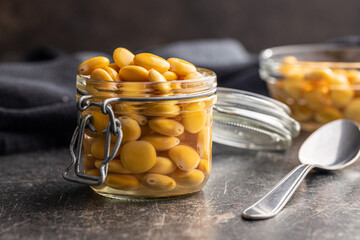 Pickled yellow Lupin Beans in jar.