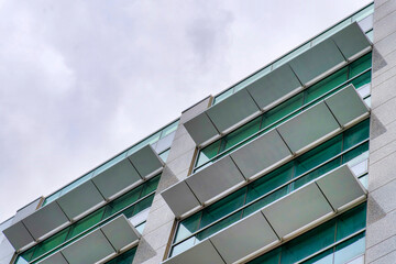 Fototapeta na wymiar Low angle view of a building with opened sunshade panels at Salt Lake City in Utah