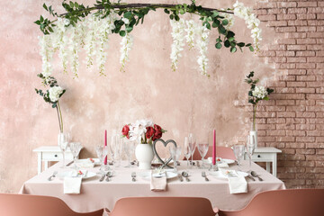 Beautiful table setting for wedding celebration in restaurant