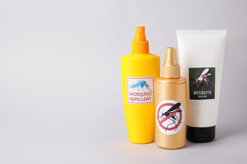 Mosquito repellent products on light background
