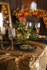 Beautiful table setting with Christmas decorations in living room