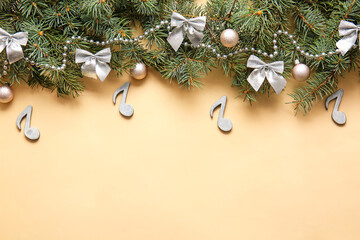 Note signs with Christmas decor and fir branches on beige background