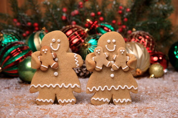 Family of Gingerbreads with kids on Holiday Christmas Background