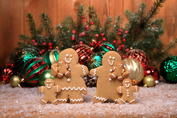 Family of Gingerbreads with 4 kids on Holiday Christmas Background
