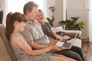 Dad and children call mom via the Internet. Online video call, chat, conversation. Or watching...