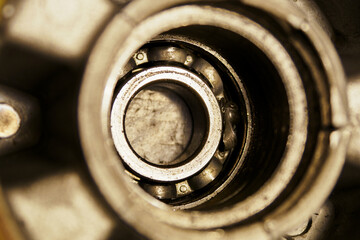 Damaged bearing cage in alloy wheel.