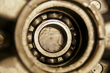 Damaged bearing cage in alloy wheel.