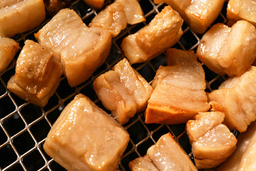 Many tasty cracklings as background, closeup