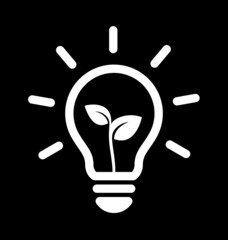 light bulb globe with seedling leaves