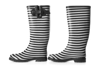 Striped rubber boots on white background