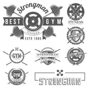 set of logo athletic club for bodybuilding, powerlifting, weightlifting crossfit and fitness training. Barbell club logo vintage design isolated on background. Emblem for gym and training of strongman