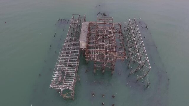 Aerial Drone view for The West Pier is a pier in Brighton, England. It was designed by Eugenius Birch and opened in 1866. 
