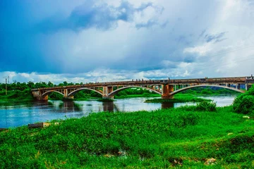 Zelfklevend Fotobehang bridge over river nyong in cameroon at mbalmayo © eric