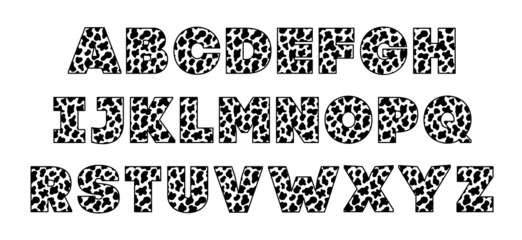 Fototapeta premium Animal font for posters. Cow spots black and white. Holstein cattle. Retro alphabet. Vintage print skins typeface, editable and layered. Vector Trendy modern chrome capital letters for banners.