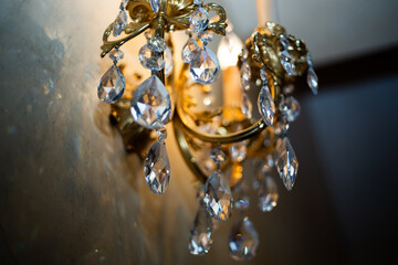 Expensive exquisite crystal chandelier in Victorian style indoor