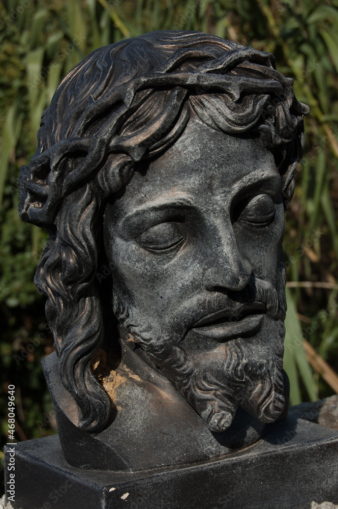 Poster statue of the face of Christ