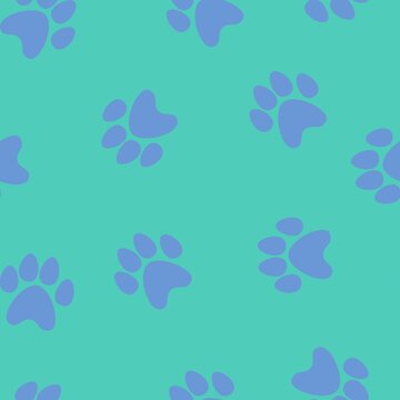 blue footprints of a cat on a green background. seamless abstraction of animal footprints for clothing or print