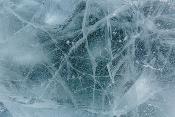 Beautiful ice of a frozen lake. Close-up.