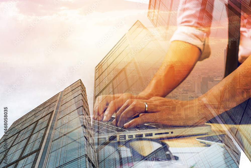 Aufkleber double exposure architecture design engineering concept, close up on workstation desk using computer