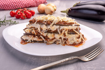Aubergine Lasagna with parmesan cheese and tomato.