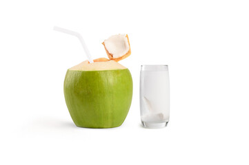Coconut drink in glass with coconut on white background
