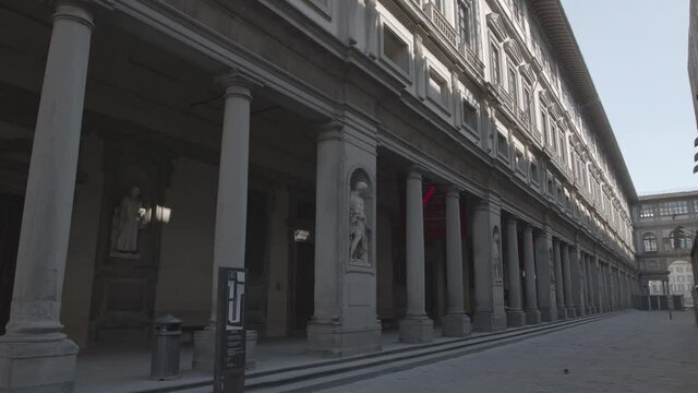 Tilt movement of Porticos of the Uffizi Gallery in Florence without People wide shot_During lockdown in Florence