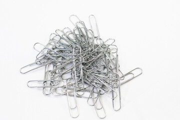 Silver metal paper clips to be use in offices and schools.