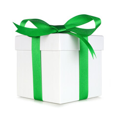 White gift box wrapped with shiny green bow and ribbon isolated on white