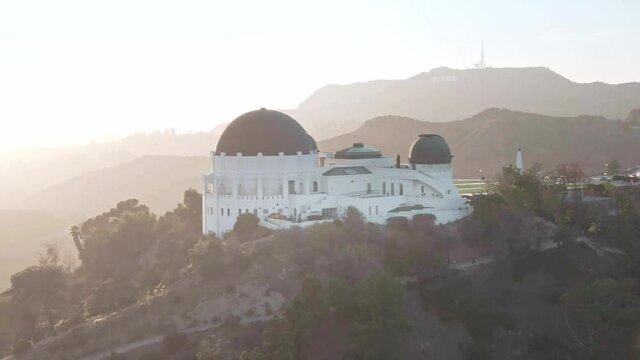 Aerial view of Griffith Park observatory. downtown Los Angeles skyline, drone 4k. California travel destination, popular tourist city in America.