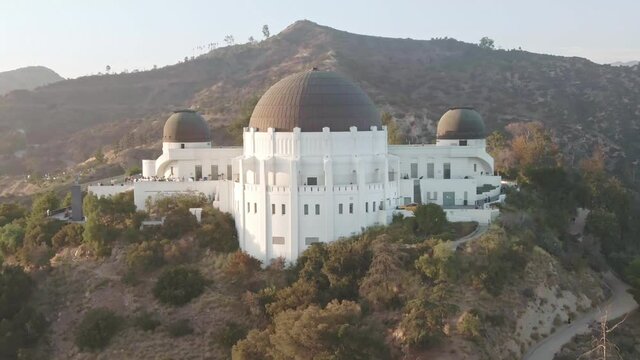 Aerial view of Griffith Park observatory, Drone 4k downtown Los Angeles skyline. California travel destination, popular tourist city in America.