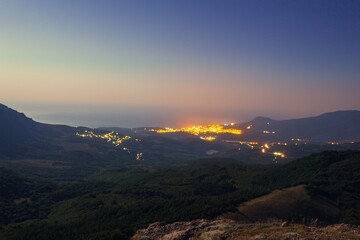 Fototapeta premium Hills with City Lights