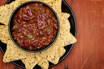 Bowl of chili with chips