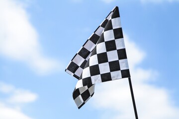 Racing Flag On Sky Background